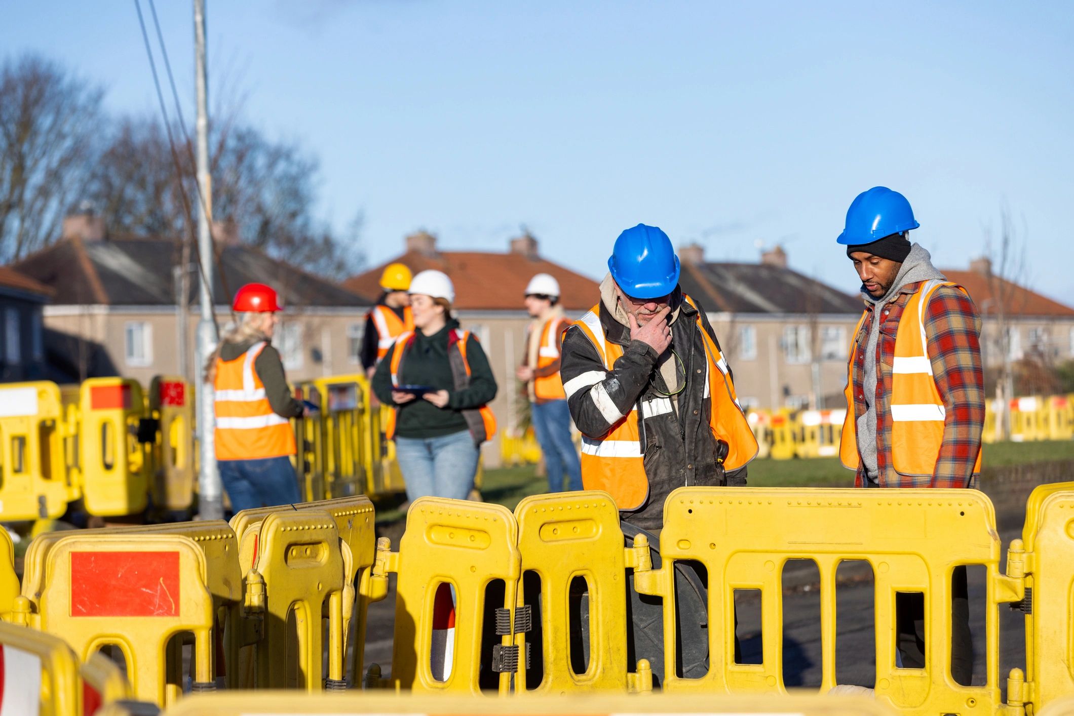 Construction team planning paving work